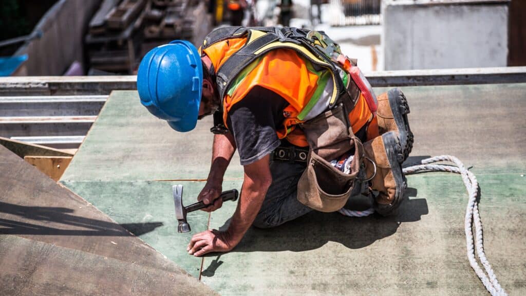 Worker with tools at height