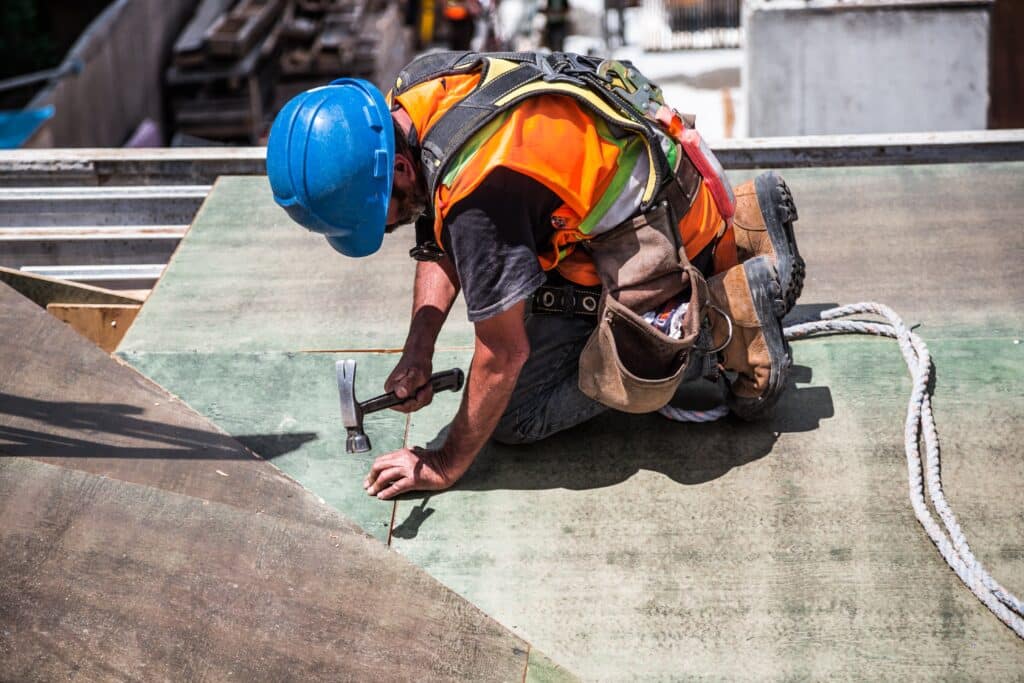 Worker with tools at height